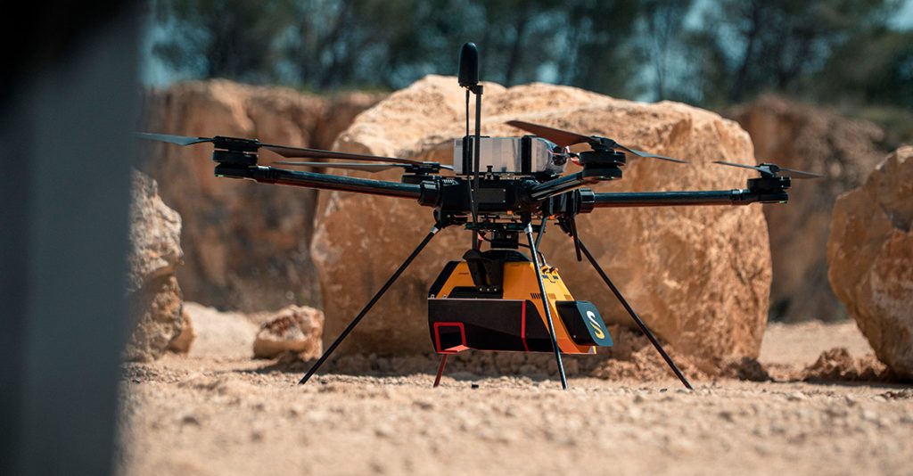 Drone-mounted LiDAR sensor on a mining site (YellowScan Voyager)