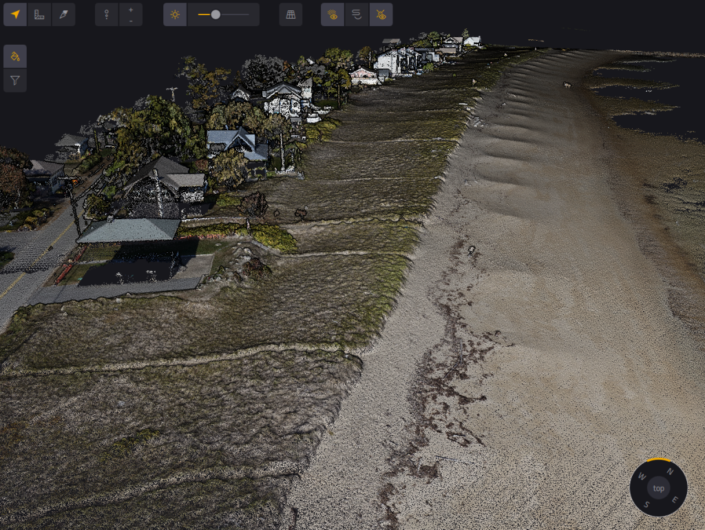 Point cloud of Hills Beach, , USA showing the houses (left side), dune (middle), and beach (right side). The steep transition from the dune to the beach is indicative of where erosion occurred during January 2024 storms that damaged most of Maine’s coastline.